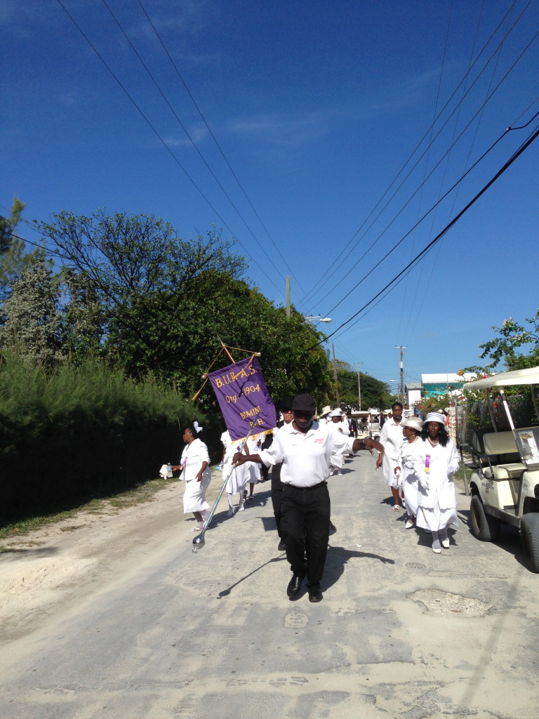 On New Year's day, after church, women in white dresses, hats and gloves, and men in their best suits dance down the street to Silent Night.